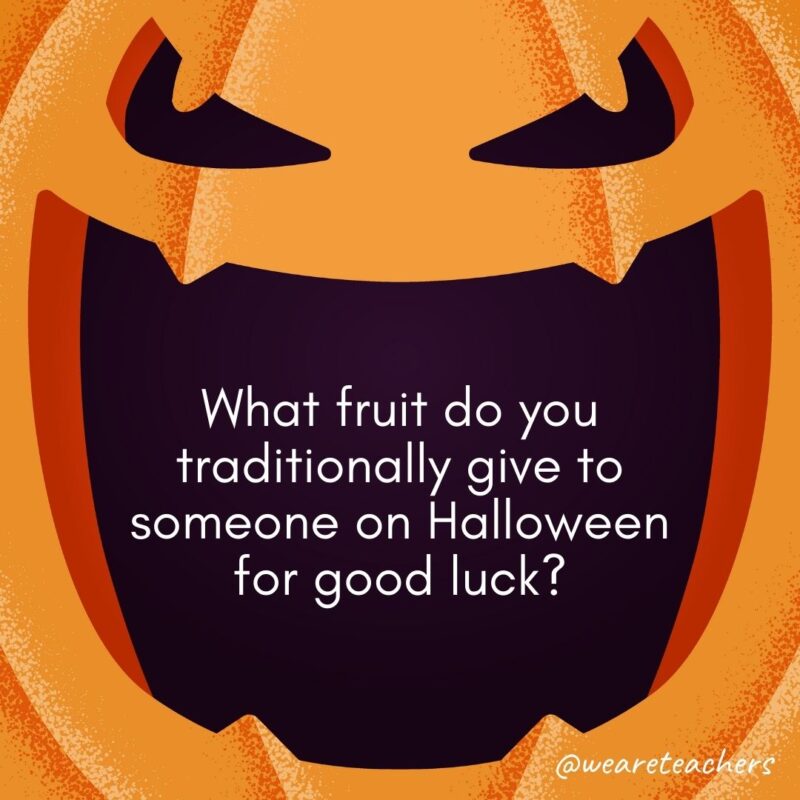 What fruit do you traditionally give to someone on Halloween for good luck?