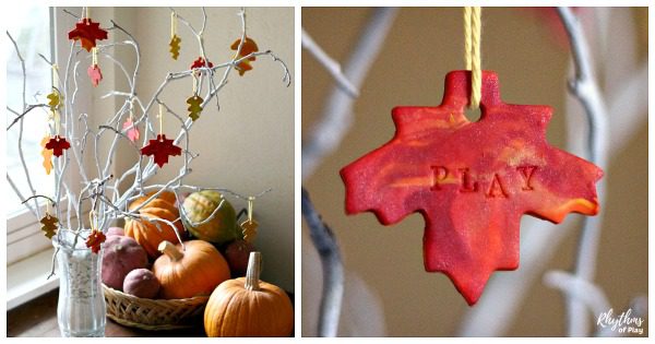 Leaves made from clay stamped with gratitude words hand from a metal tree form