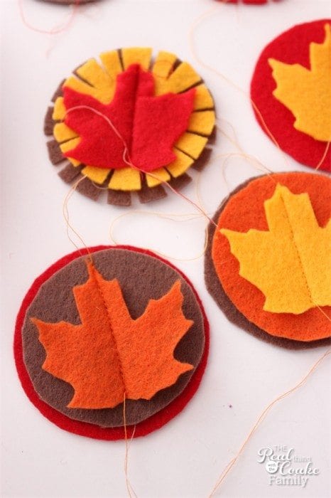 Colorful napkin rings  with a leaf in the center made from felt