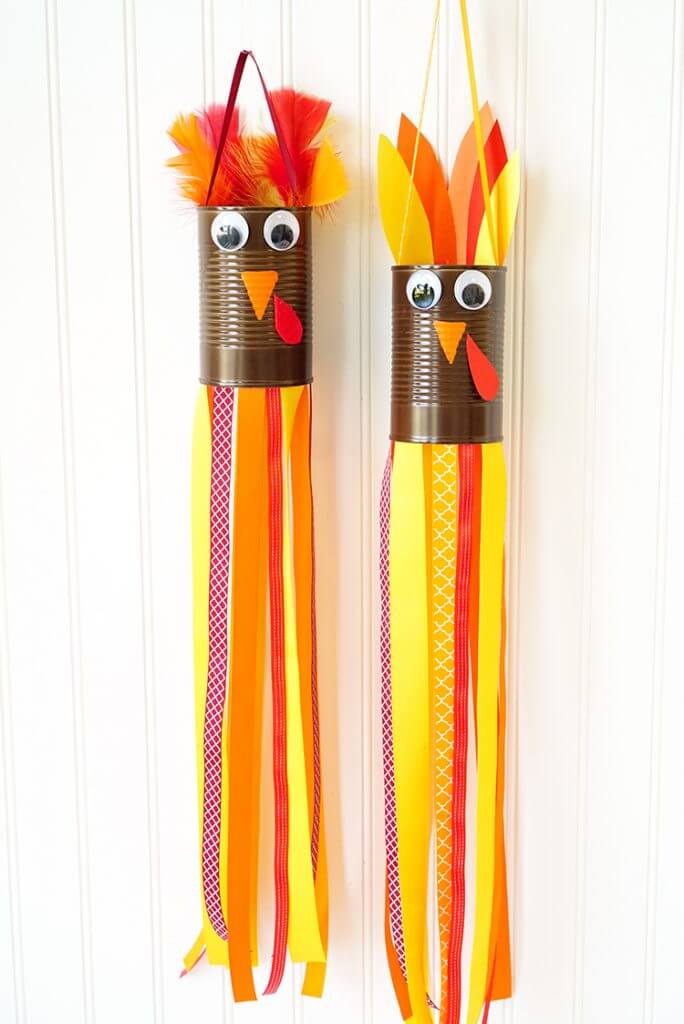 Colorful turkey windsocks made from tin cans