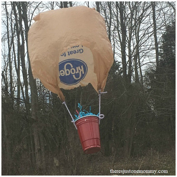 egg in a cup with a plastic bag parachute 