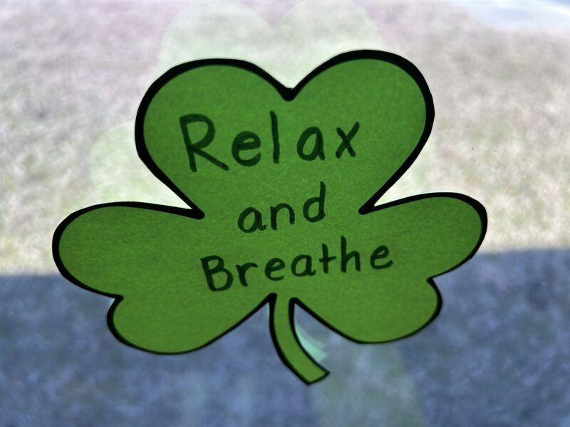 shamrock with words relax and breathe