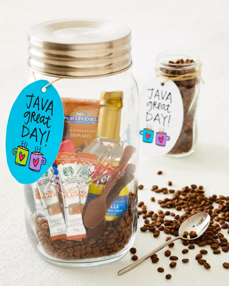A glass jar has different coffee related items in it 
