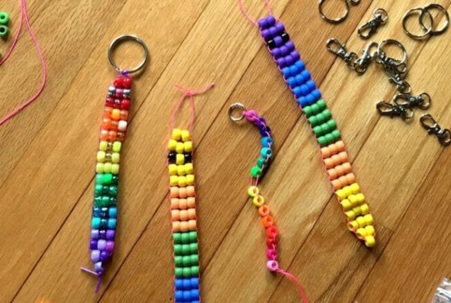 DIY fidget toys: Pony beads strung on vinyl laces in various patterns