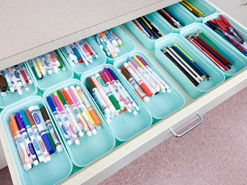 organization-markers markers and pencils in individual containers in a draw for a classroom hack