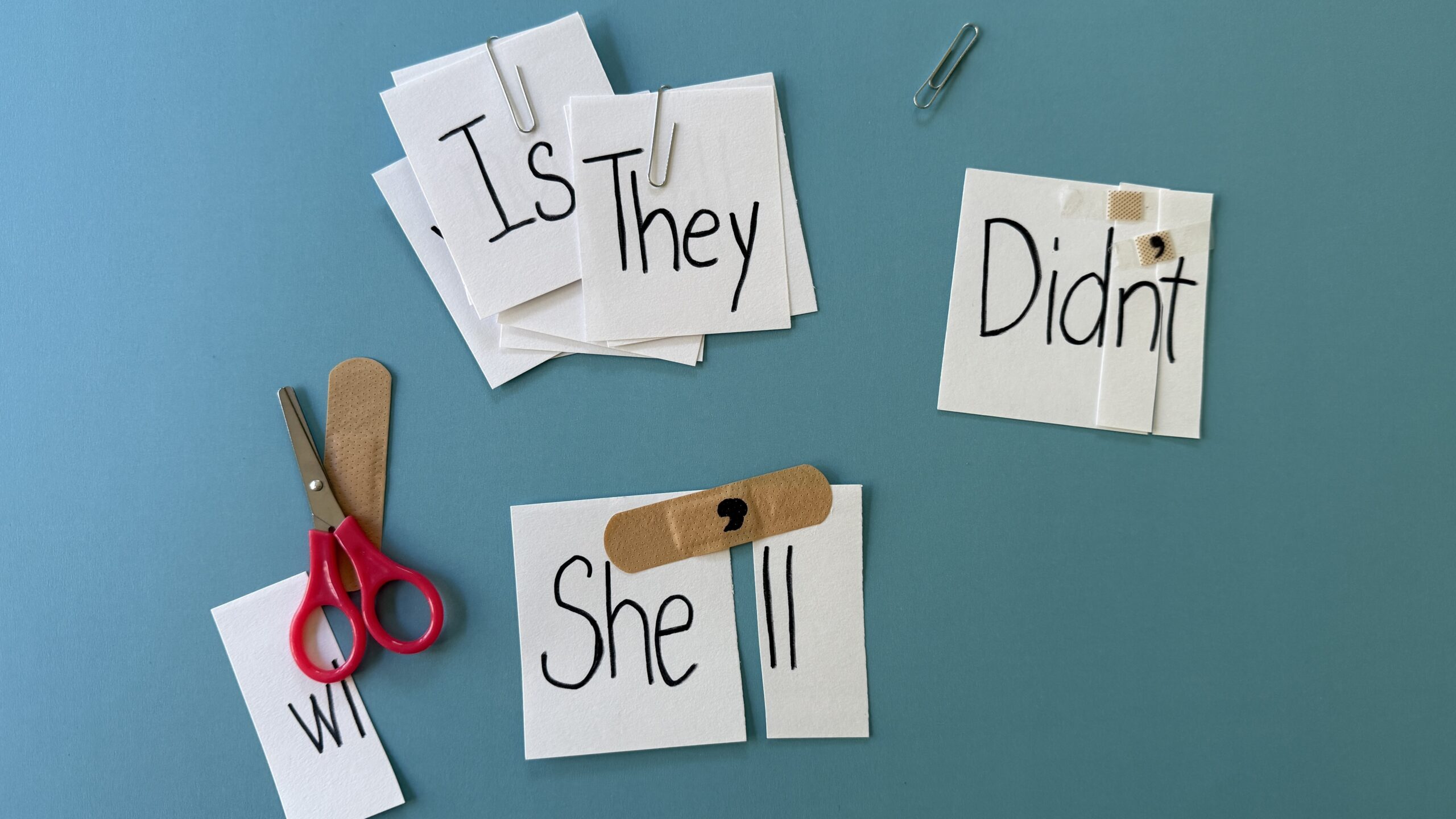 Contraction Surgery with cut up pieces of paper and a bandaid Contraction Surgery with cut up pieces of paper and a bandaid