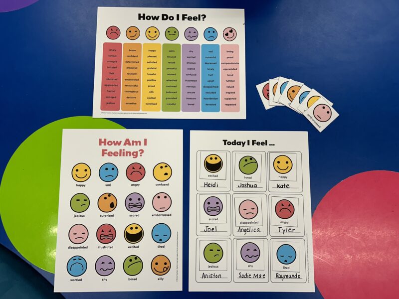 Feelings Chart Printable feelings chart on a colorful background in a classroom.
