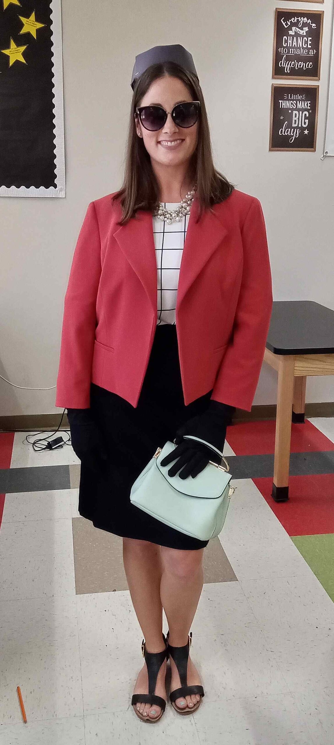 Teacher dressed in one of Jackie Kennedy's iconic outfits for Halloween