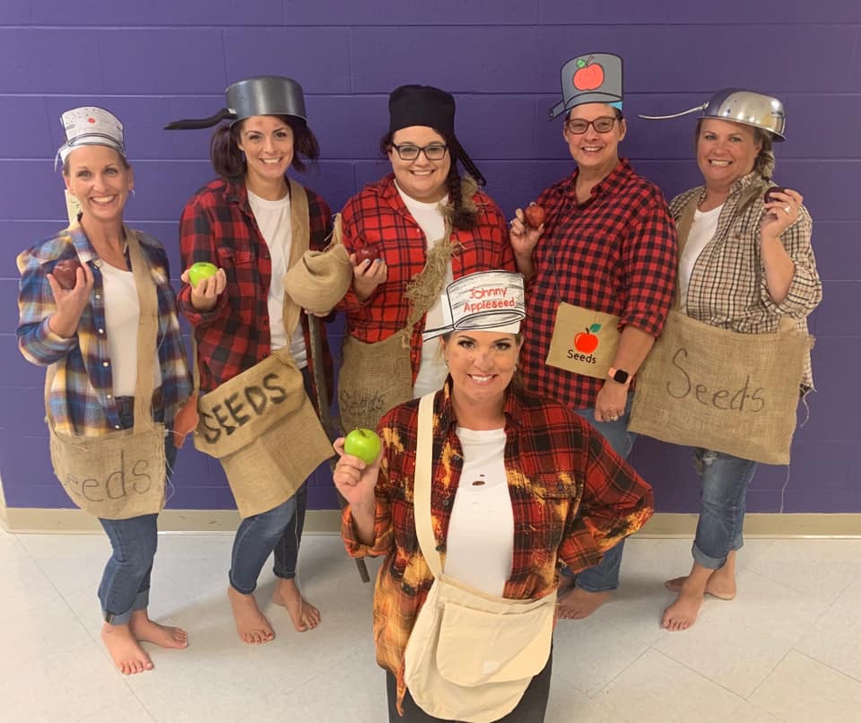 Teachers dressed in Johnny Appleseed costumes