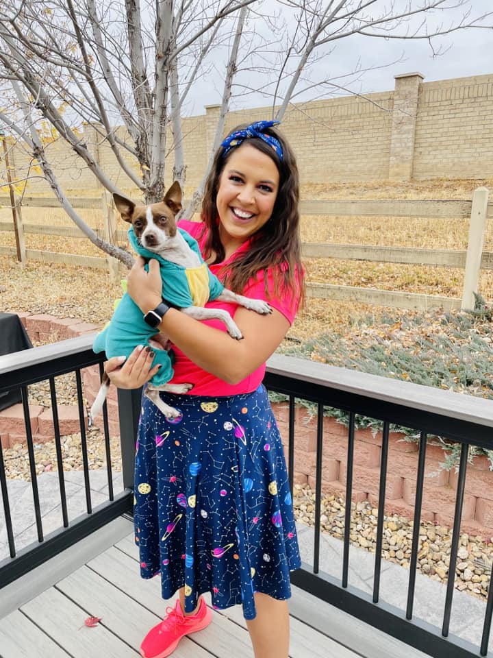 Teacher dressed as Ms. Frizzle and her dog dressed as Liz