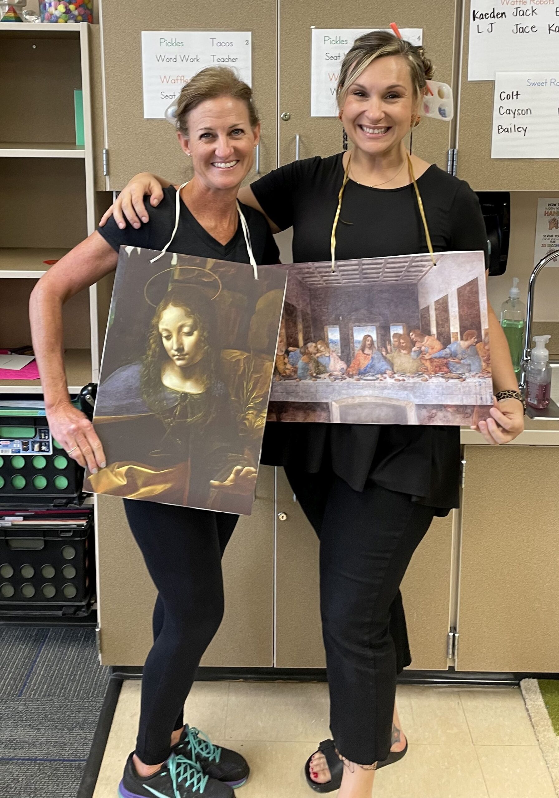 Teachers wearing paintings as Halloween costumes