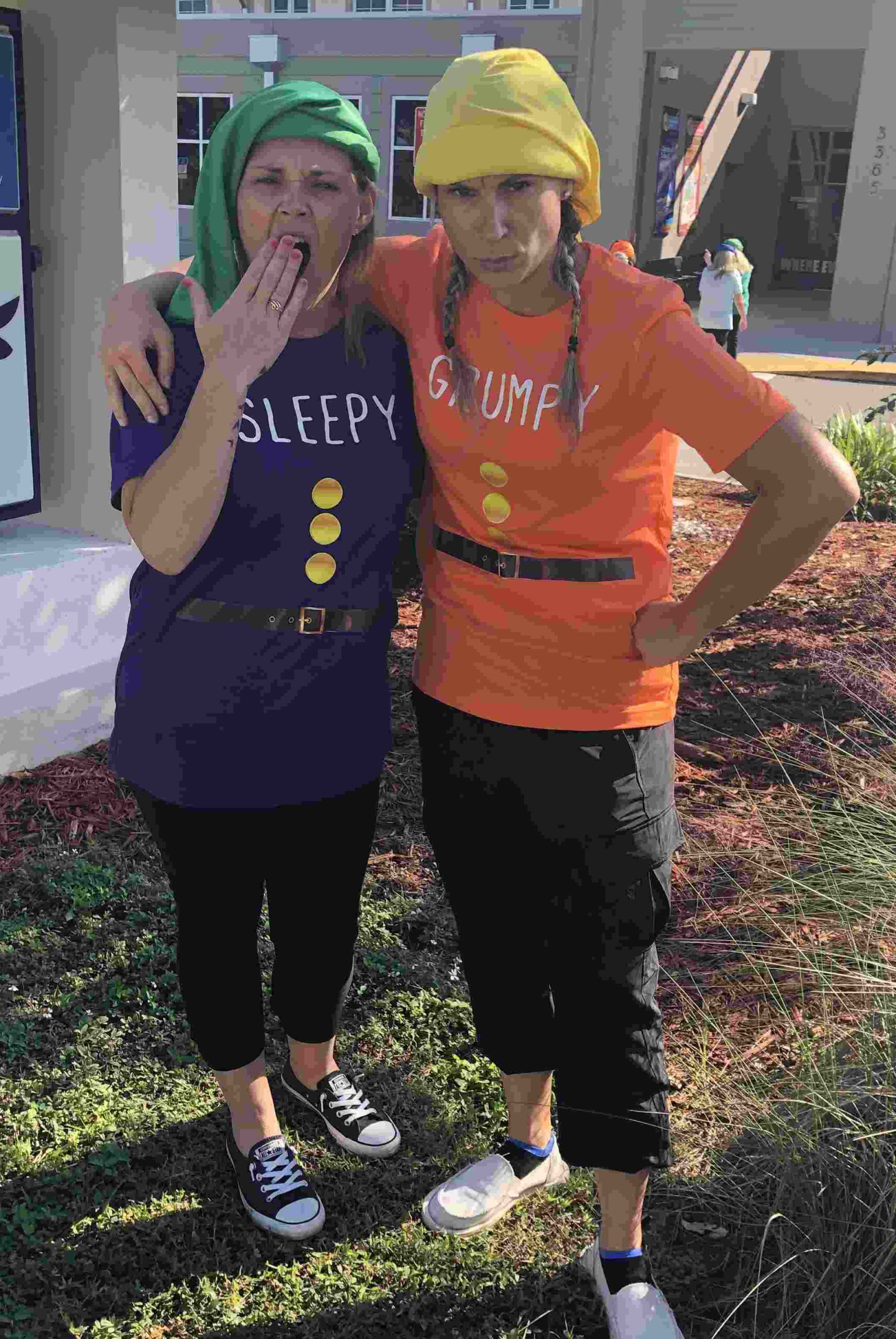 Two teachers dressed as dwarves from Snow White