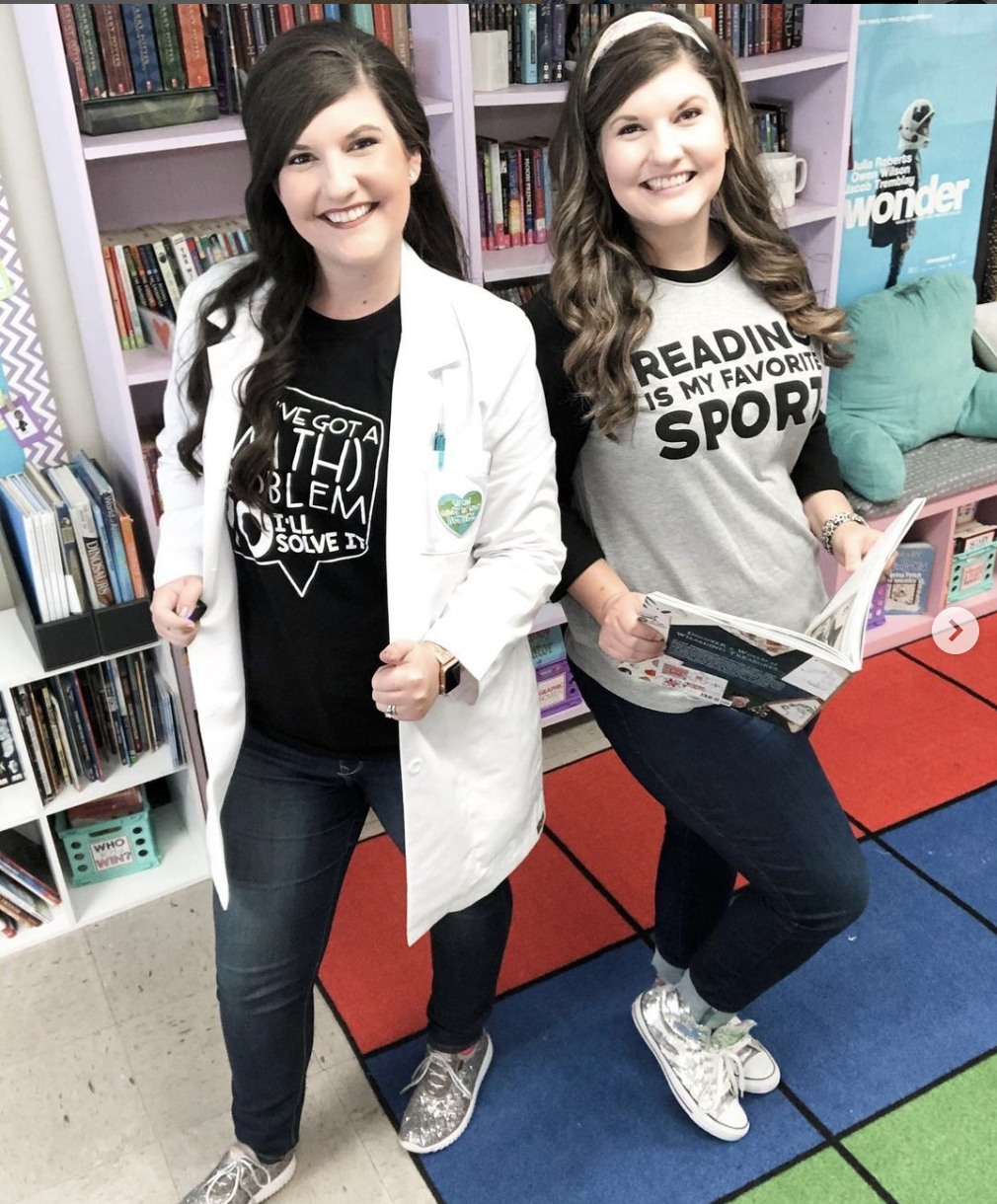 Two teachers, each dressed in the style of the other