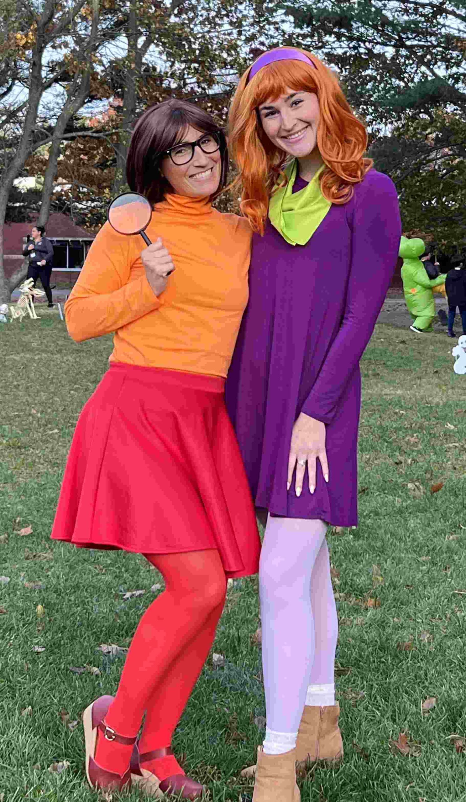Teachers dressed as Velma and Daphne from Scooby Doo for Halloween