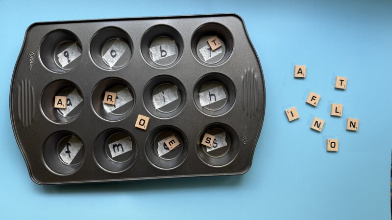 Letters of alphabet in muffin tin
